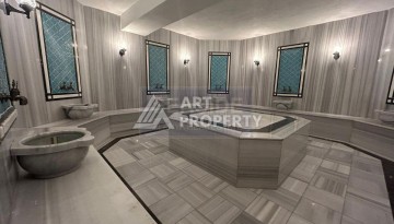 Квартира 1+1 на улице Барбаросса с боковым видом на море в Махмутларе, 55 кв.м. - Ракурс 8