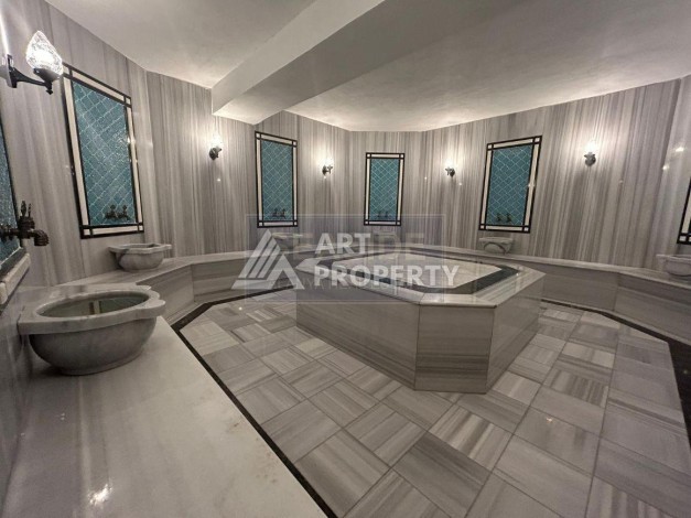 Квартира 1+1 на улице Барбаросса с боковым видом на море в Махмутларе, 55 кв.м. - Ракурс 7