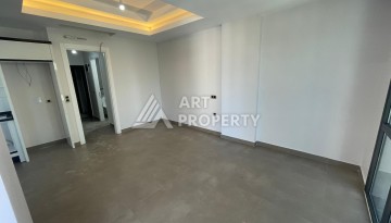 Квартира 1+1 на улице Барбаросса с боковым видом на море в Махмутларе, 55 кв.м. - Ракурс 10