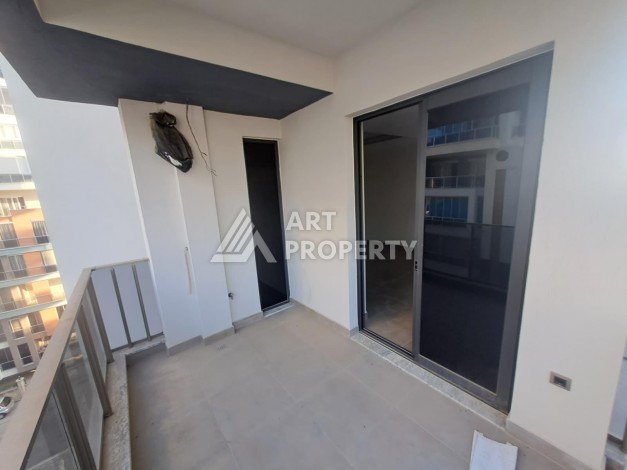 Квартира 1+1 на улице Барбаросса с боковым видом на море в Махмутларе, 55 кв.м. - Ракурс 11