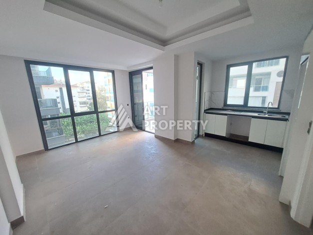 Квартира 1+1 на улице Барбаросса с боковым видом на море в Махмутларе, 55 кв.м. - Ракурс 12