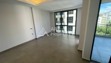 Квартира 1+1 на улице Барбаросса с боковым видом на море в Махмутларе, 55 кв.м. - Ракурс 15