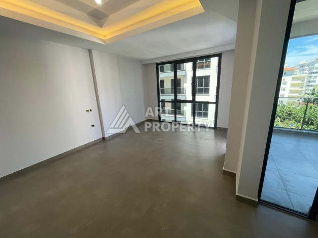 Квартира 1+1 на улице Барбаросса с боковым видом на море в Махмутларе, 55 кв.м. - Ракурс 14