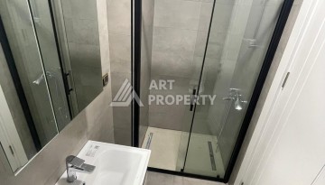 Квартира 1+1 на улице Барбаросса с боковым видом на море в Махмутларе, 55 кв.м. - Ракурс 16