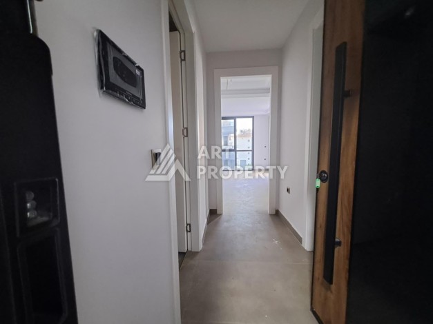 Квартира 1+1 на улице Барбаросса с боковым видом на море в Махмутларе, 55 кв.м. - Ракурс 16