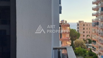Квартира 1+1 на улице Барбаросса с боковым видом на море в Махмутларе, 55 кв.м. - Ракурс 20