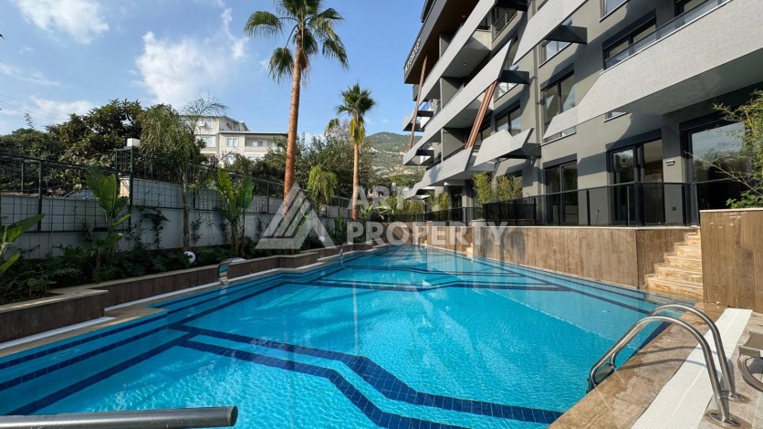 Квартира 1+1 с мебелью в районе Джикджилли, 50 кв.м. - Ракурс 2