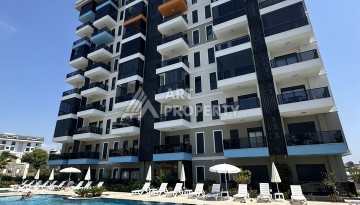 Квартира 1+1 в резиденции с отлично организованной территорией, 50 кв.м. Авсаллар, Алания - Ракурс 1