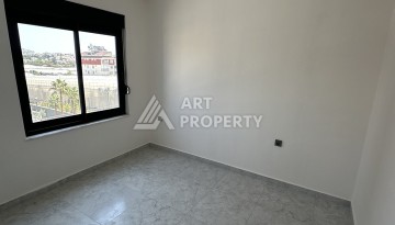Квартира 1+1 в резиденции с отлично организованной территорией, 50 кв.м. Авсаллар, Алания - Ракурс 13