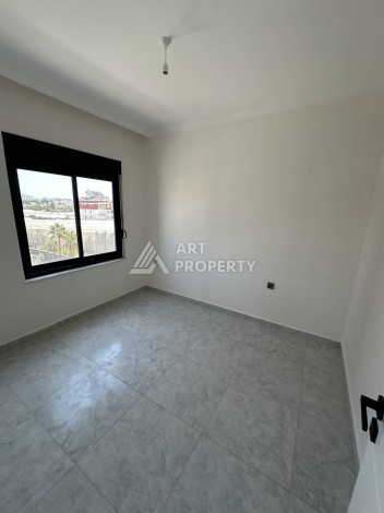 Квартира 1+1 в резиденции с отлично организованной территорией, 50 кв.м. Авсаллар, Алания - Ракурс 12