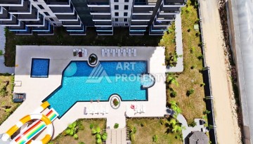 Квартира 1+1 в резиденции с отлично организованной территорией, 50 кв.м. Авсаллар, Алания - Ракурс 22