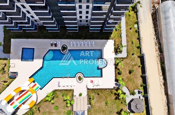 Квартира 1+1 в резиденции с отлично организованной территорией, 50 кв.м. Авсаллар, Алания - Ракурс 21