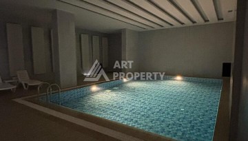 Квартира 1+1 в новом доме 2023 года с отельной инфраструктурой в районе Авсаллар - Ракурс 4