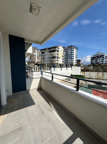 Квартира 1+1 в новом доме 2023 года с отельной инфраструктурой в районе Авсаллар - Ракурс 24