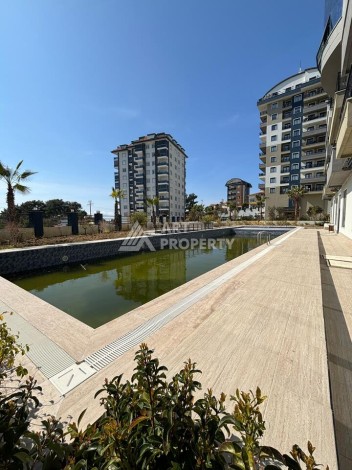 Квартира 1+1 в новом доме 2023 года с отельной инфраструктурой в районе Авсаллар - Ракурс 31