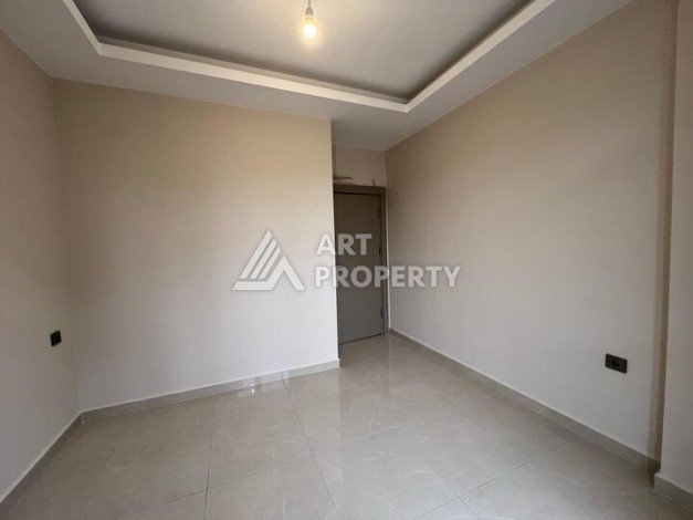 Квартира 1+1 по выгодной цене в новом доме 2025 года в районе Авсаллар - Ракурс 11