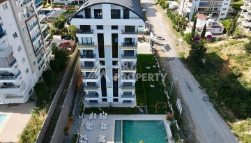 Квартира 1+1 по выгодной цене в новом доме 2025 года в районе Авсаллар - Ракурс 21