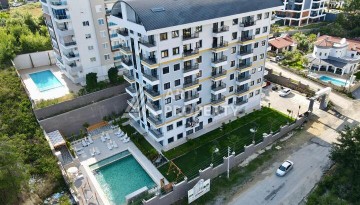 Квартира 1+1 по выгодной цене в новом доме 2025 года в районе Авсаллар - Ракурс 25