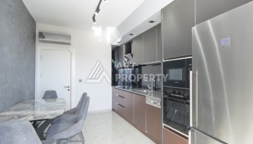 Шикарная квартира 2+1 с видом на море и большой террасой в Махмутларе - Ракурс 5