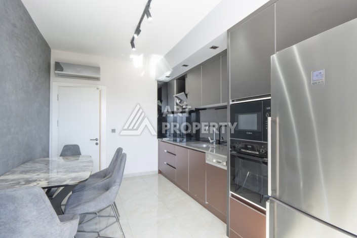 Шикарная квартира 2+1 с видом на море и большой террасой в Махмутларе - Ракурс 4