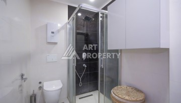 Шикарная квартира 2+1 с видом на море и большой террасой в Махмутларе - Ракурс 7