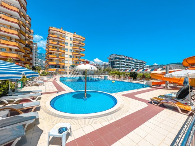 Квартира 2+1 на первой береговой линии в Махмутларе с панорамным видом на море - Ракурс 0