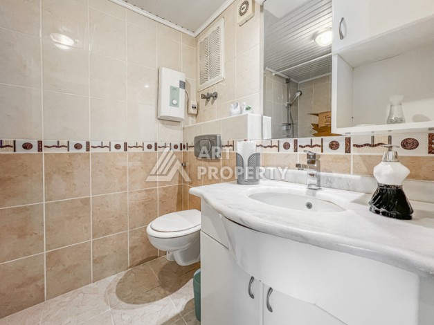 Квартира 2+1 на первой береговой линии в Махмутларе с панорамным видом на море - Ракурс 8