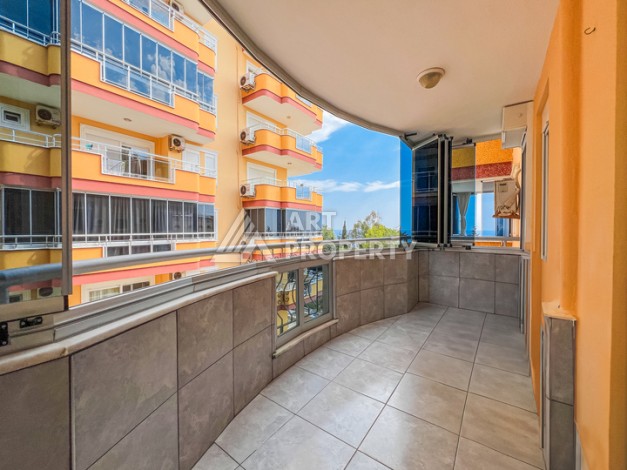 Квартира 2+1 на первой береговой линии в Махмутларе с панорамным видом на море - Ракурс 13