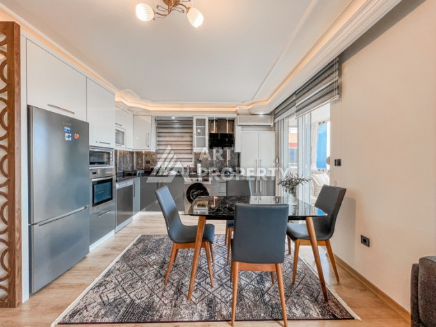 Квартира 2+1 на первой береговой линии в Махмутларе с панорамным видом на море - Ракурс 14