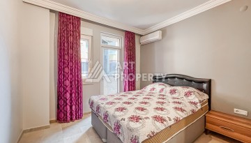 Квартира 2+1 на первой береговой линии в Махмутларе с панорамным видом на море - Ракурс 19