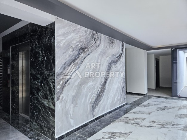 Две квартиры 1+1 с рассрочкой в новом комплексе в Махмутларе — 600 м до моря - Ракурс 4