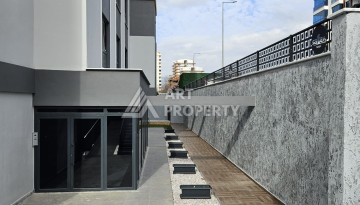 Две квартиры 1+1 с рассрочкой в новом комплексе в Махмутларе — 600 м до моря - Ракурс 6