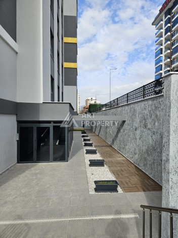 Две квартиры 1+1 с рассрочкой в новом комплексе в Махмутларе — 600 м до моря - Ракурс 5