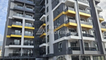 Две квартиры 1+1 с рассрочкой в новом комплексе в Махмутларе — 600 м до моря - Ракурс 9