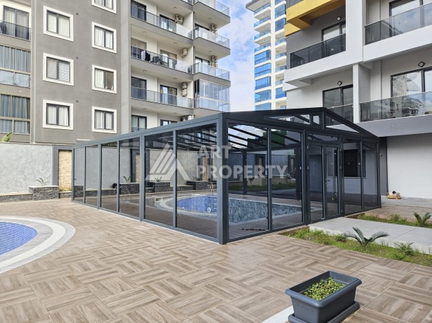 Две квартиры 1+1 с рассрочкой в новом комплексе в Махмутларе — 600 м до моря - Ракурс 10