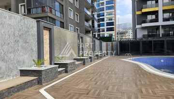 Две квартиры 1+1 с рассрочкой в новом комплексе в Махмутларе — 600 м до моря - Ракурс 13