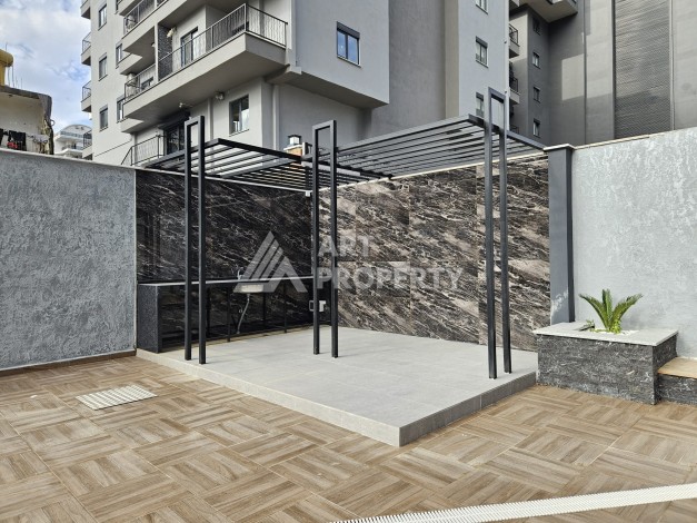 Две квартиры 1+1 с рассрочкой в новом комплексе в Махмутларе — 600 м до моря - Ракурс 14