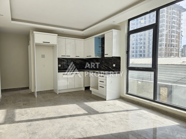 Две квартиры 1+1 с рассрочкой в новом комплексе в Махмутларе — 600 м до моря - Ракурс 18