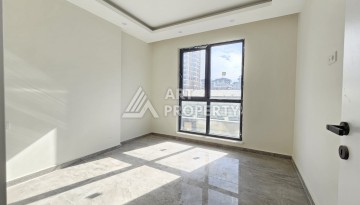 Две квартиры 1+1 с рассрочкой в новом комплексе в Махмутларе — 600 м до моря - Ракурс 21