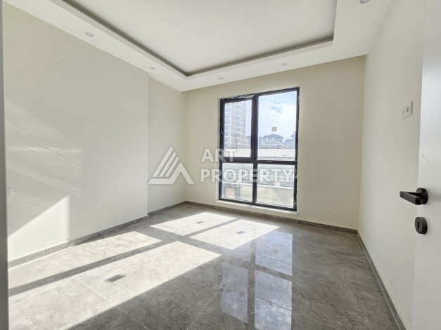 Две квартиры 1+1 с рассрочкой в новом комплексе в Махмутларе — 600 м до моря - Ракурс 20