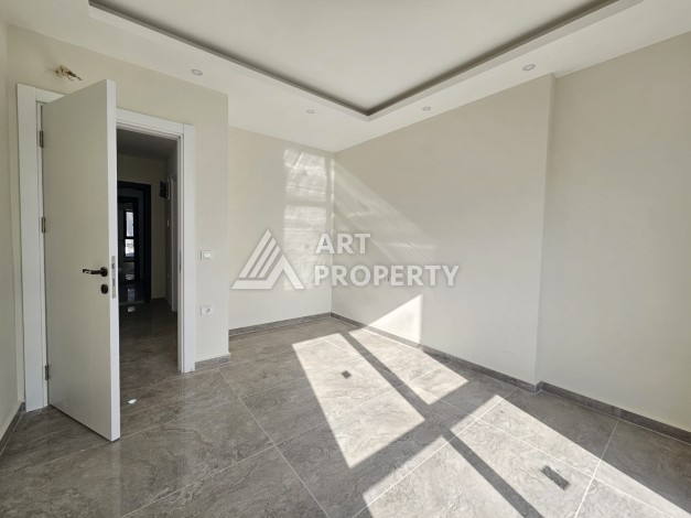 Две квартиры 1+1 с рассрочкой в новом комплексе в Махмутларе — 600 м до моря - Ракурс 21