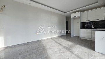 Две квартиры 1+1 с рассрочкой в новом комплексе в Махмутларе — 600 м до моря - Ракурс 23