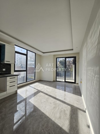 Две квартиры 1+1 с рассрочкой в новом комплексе в Махмутларе — 600 м до моря - Ракурс 23