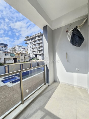 Две квартиры 1+1 с рассрочкой в новом комплексе в Махмутларе — 600 м до моря - Ракурс 25