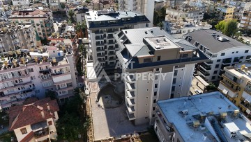 Квартиры от 60 до 164 кв.м. в элитной резиденции в центре Алании - Ракурс 35