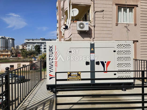 Квартиры 1+1 и дуплексы 2+1 в новом доме в центре Махмутлара. - Ракурс 1