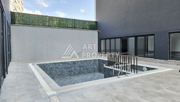 Квартиры 1+1 и дуплексы 2+1 в новом доме в центре Махмутлара. - Ракурс 7