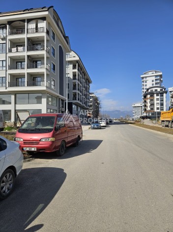 Квартиры 1+1 и дуплексы 2+1 в новом доме в центре Махмутлара. - Ракурс 7