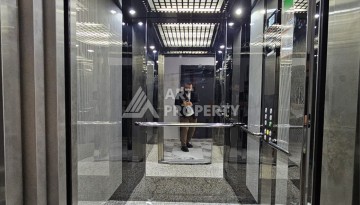 Квартиры 1+1 и дуплексы 2+1 в новом доме в центре Махмутлара. - Ракурс 10