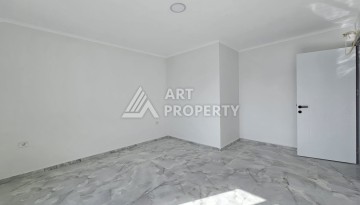 Квартиры 1+1 и дуплексы 2+1 в новом доме в центре Махмутлара. - Ракурс 11